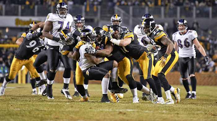 Willis McGahee meets up with the Steelers D, January 2011.